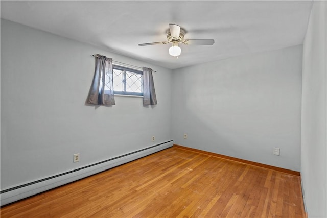 unfurnished room with light wood finished floors, ceiling fan, a baseboard heating unit, and baseboards