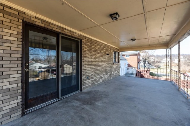 view of patio / terrace with an attached carport