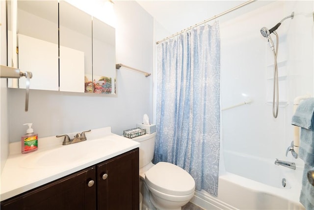 bathroom featuring vanity, toilet, and shower / tub combo