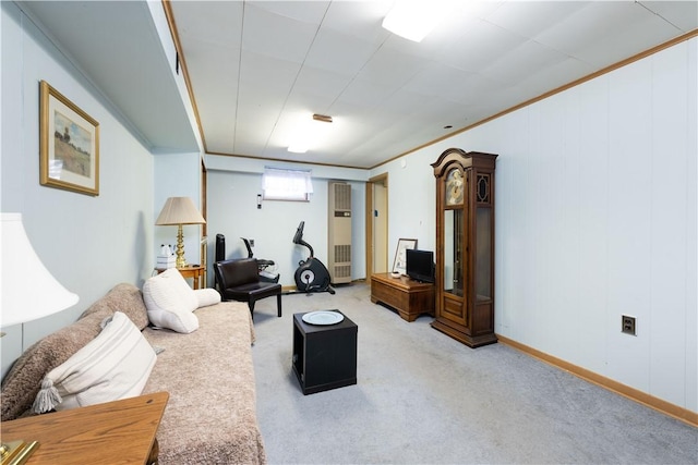 living room with baseboards, light colored carpet, and crown molding