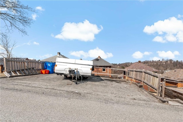 view of car parking with fence