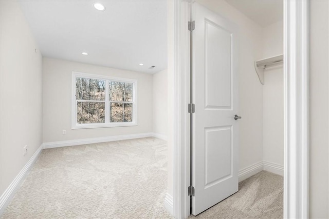 spacious closet with carpet