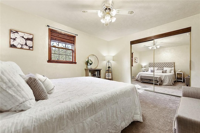 bedroom with a closet, carpet flooring, and ceiling fan