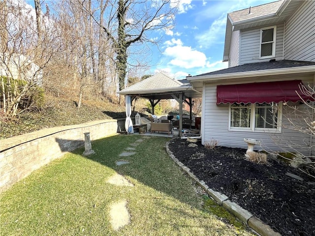 view of yard with an outdoor living space and a patio area