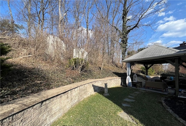 view of yard featuring a gazebo, an outdoor living space, and a patio