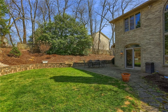 view of yard with a patio and fence