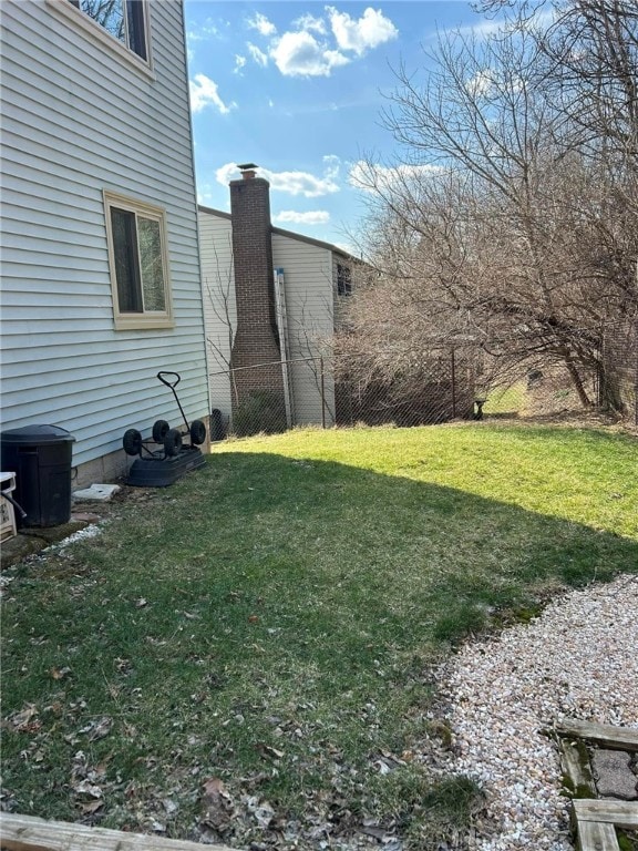 view of yard featuring fence