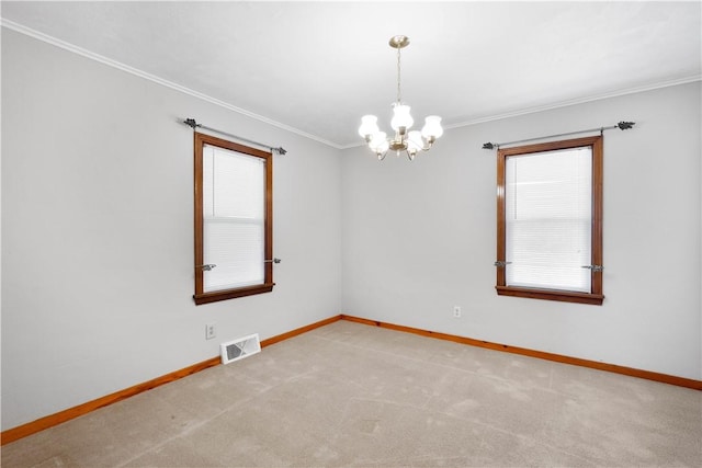 unfurnished room featuring a notable chandelier, light colored carpet, visible vents, and baseboards