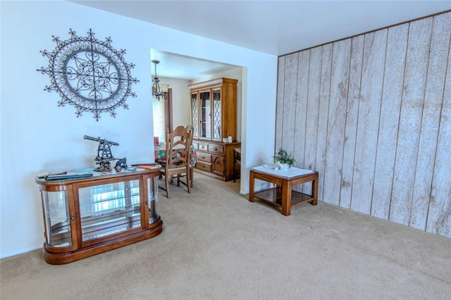 sitting room featuring carpet floors