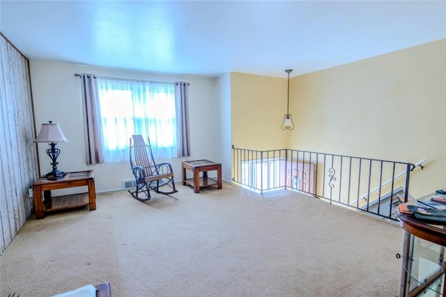 living area with carpet flooring