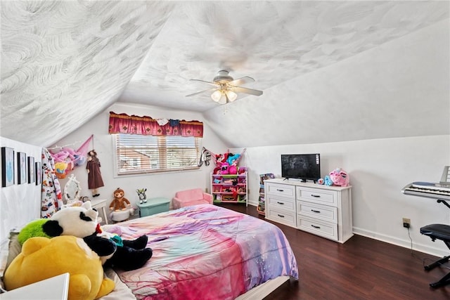 bedroom featuring dark wood-type flooring, lofted ceiling, a textured ceiling, baseboards, and ceiling fan