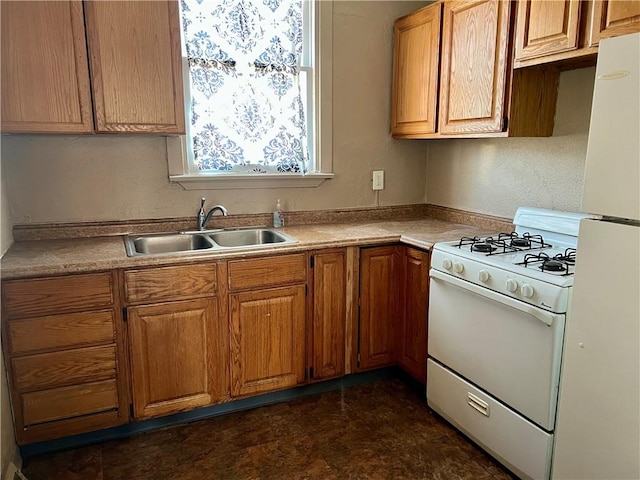 kitchen with a sink, white appliances, brown cabinets, and light countertops