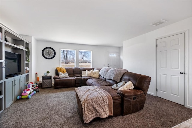 carpeted living room featuring visible vents
