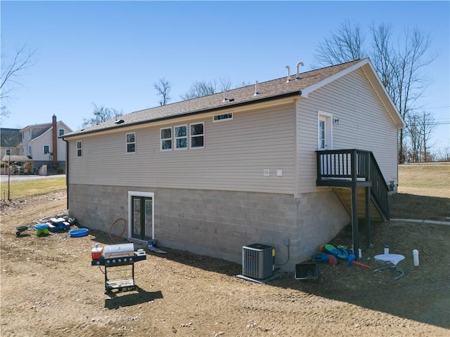 back of house with cooling unit