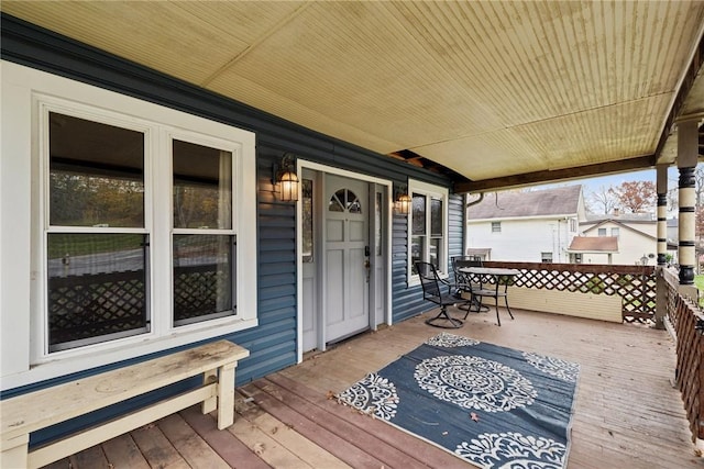 wooden terrace featuring a porch