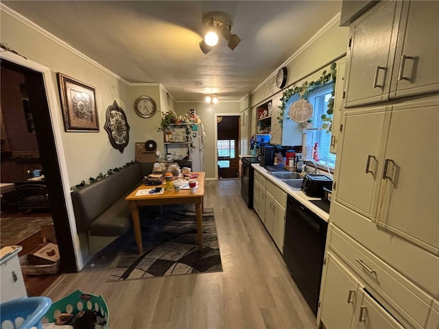 319 Cedar Ave, Sharon, PA 16146 - kitchen with light countertops, light wood-type flooring, black dishwasher, ornamental molding, and a sink
