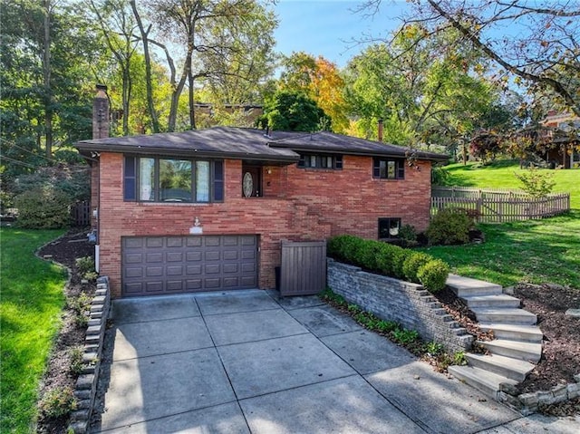 view of front facade with a front lawn, fence, concrete driveway, an attached garage, and a chimney