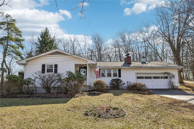 single story home with a garage, driveway, a front lawn, and a chimney