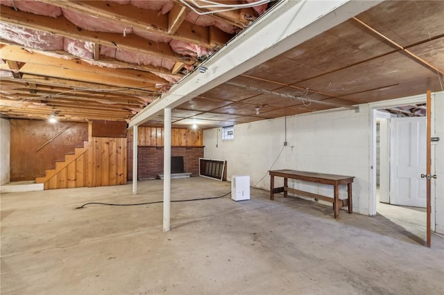 unfinished basement with stairway