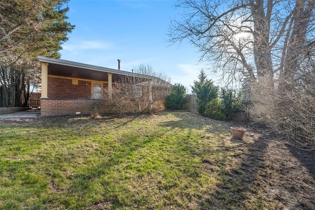 view of yard featuring fence