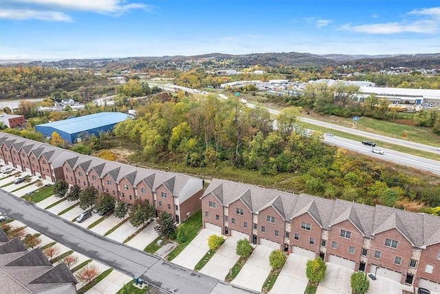 birds eye view of property with a residential view