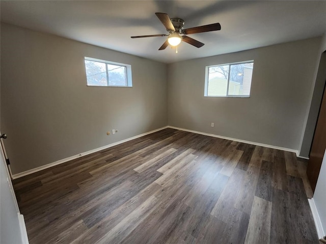 60 Broadhead Ave, Crafton, PA 15205 - unfurnished bedroom featuring baseboards, multiple windows, dark wood-style floors, and a ceiling fan
