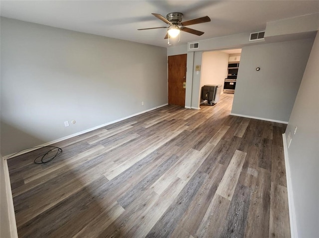 60 Broadhead Ave, Crafton, PA 15205 - empty room featuring visible vents, baseboards, ceiling fan, and wood finished floors