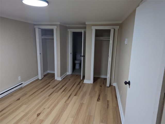 60 Broadhead Ave, Crafton, PA 15205 - unfurnished bedroom with crown molding, baseboards, multiple closets, baseboard heating, and light wood-style flooring