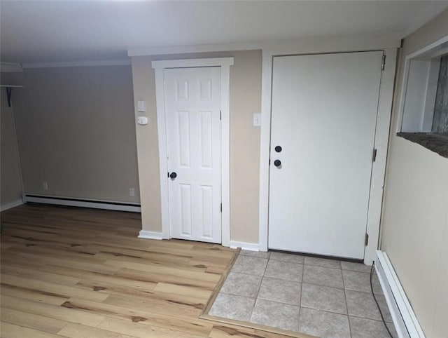 60 Broadhead Ave, Crafton, PA 15205 - foyer with crown molding, baseboards, light wood-type flooring, and a baseboard radiator