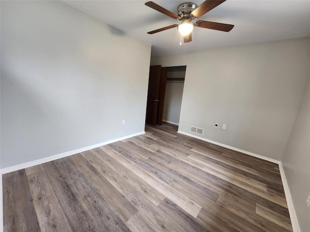 60 Broadhead Ave, Crafton, PA 15205 - unfurnished bedroom featuring a ceiling fan, wood finished floors, visible vents, baseboards, and a closet