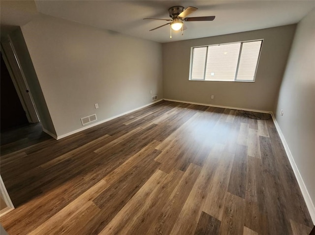 60 Broadhead Ave, Crafton, PA 15205 - empty room featuring visible vents, baseboards, ceiling fan, and dark wood-style flooring