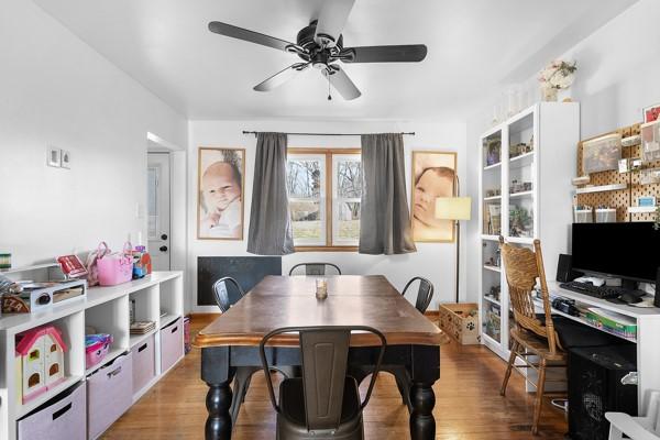 dining room featuring wood finished floors and a ceiling fan