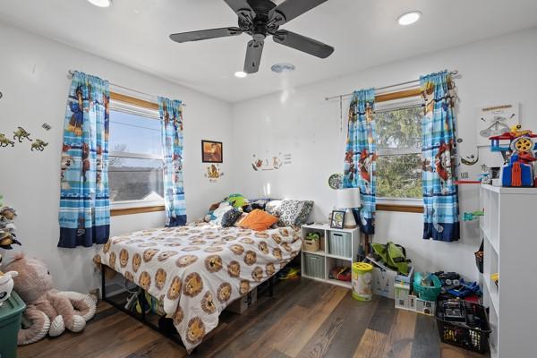 bedroom featuring recessed lighting, wood finished floors, and ceiling fan