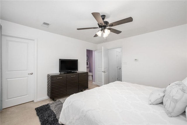 bedroom with light carpet, visible vents, baseboards, and a ceiling fan