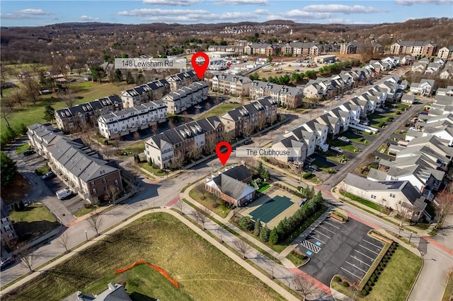 birds eye view of property with a residential view