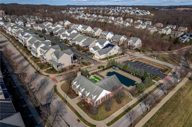 birds eye view of property with a residential view