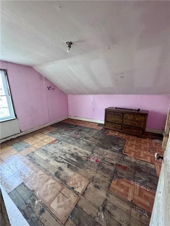 bonus room featuring lofted ceiling