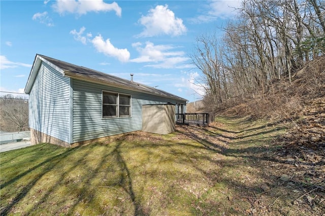 view of property exterior featuring a yard