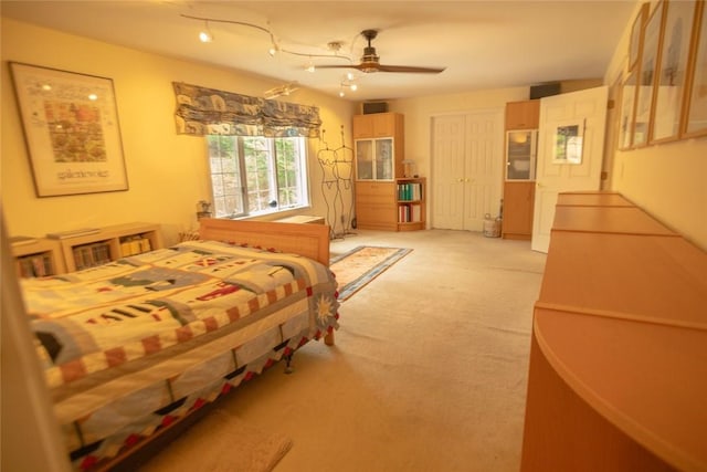 bedroom featuring light carpet