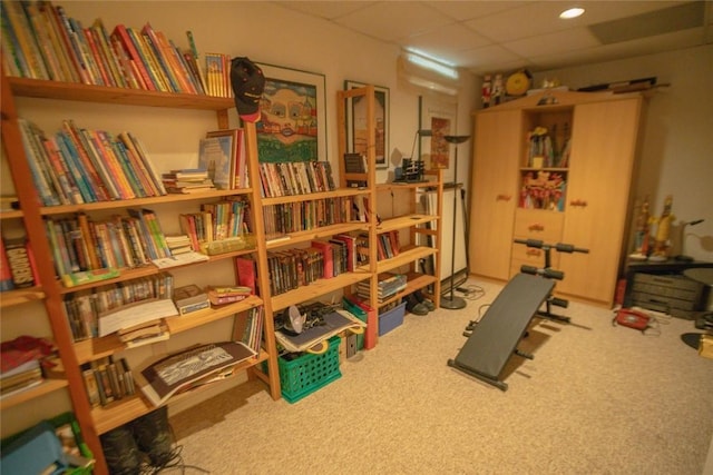 interior space featuring recessed lighting, a drop ceiling, and carpet floors