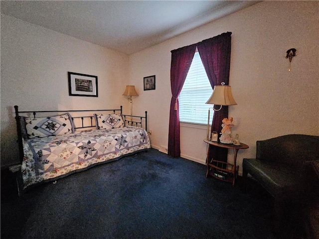 carpeted bedroom with baseboards