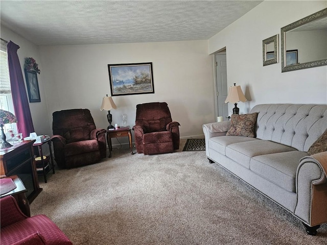 carpeted living room featuring a textured ceiling