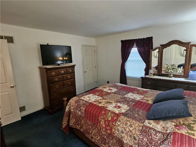 carpeted bedroom with visible vents