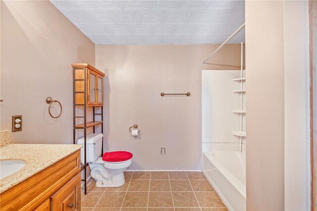 full bath featuring shower / bathing tub combination, toilet, vanity, and tile patterned flooring