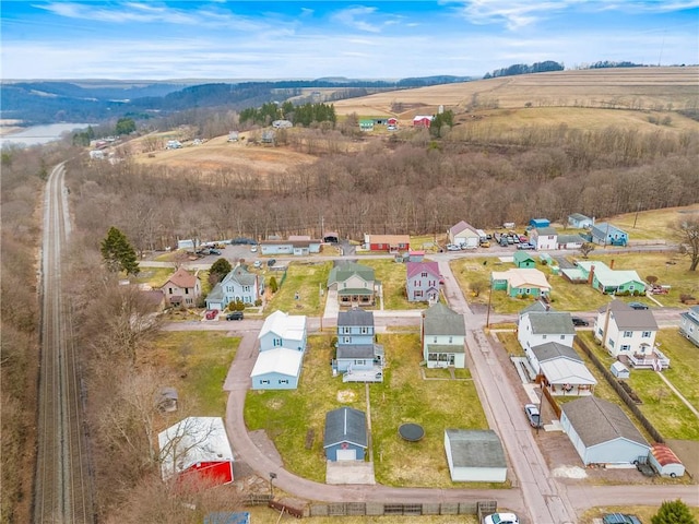 birds eye view of property with a residential view