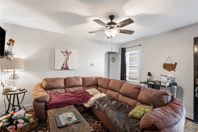 living area featuring ceiling fan