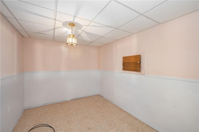 empty room with a drop ceiling