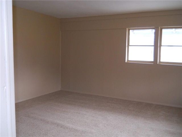 view of carpeted spare room