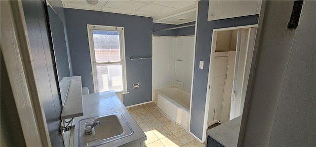 full bathroom with vanity, tile patterned floors, a paneled ceiling, and shower / bath combination