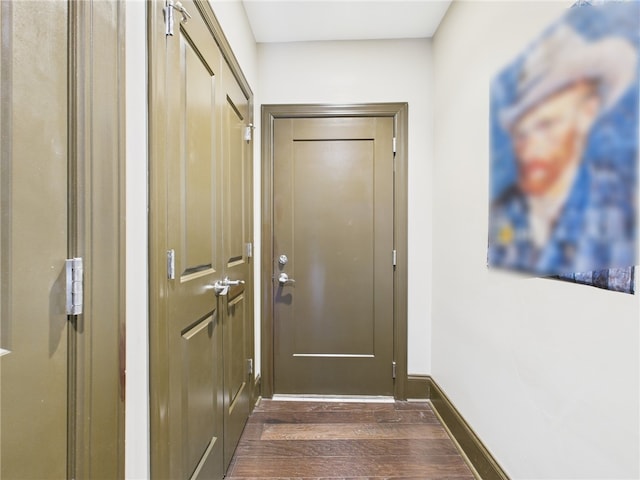 5267 Holmes St Unit 205, Lawrenceville, PA 15201 - doorway with baseboards and dark wood-type flooring